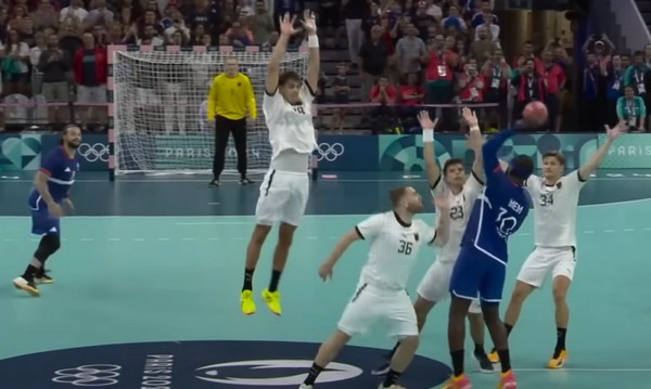 Why do handball passing errors occur under pressure?