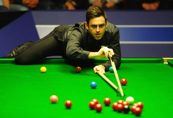 Is late frame tension the deciding factor in a close snooker match?